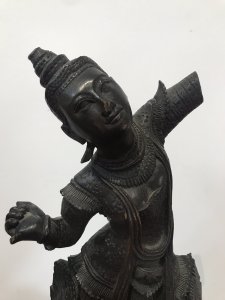 Antique Wood Carving Thai Buddha Figural Female Statue Fine Carved Details Interesting Hardwood Sculpture On Wood Base Genuine Antiquity 19th Century Sculpture Please Note- Right Arm Missing, Fingers Missing Off Left Hand, Component Missing On Back. All Due To Age Of The Piece. Adds To Charm Of The Item Dimensions In Inches Height 19” Width 7.5” Weight Approx 5KG