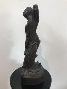 Antique Wood Carving Thai Buddha Figural Female Statue Fine Carved Details Interesting Hardwood Sculpture On Wood Base Genuine Antiquity 19th Century Sculpture Please Note- Right Arm Missing, Fingers Missing Off Left Hand, Component Missing On Back. All Due To Age Of The Piece. Adds To Charm Of The Item Dimensions In Inches Height 19” Width 7.5” Weight Approx 5KG