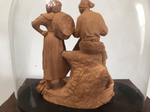 Victorian Terracotta Sculpture ‘Fisherman Mending His Net’ Signed S NO GRASSO. Fisherman Sits Smoking A Pipe Bare Foot On A Rock Whilst Mending His Fishing Net. Lady With Basket Over Her Shoulder Stands Taking To The Fisherman. Terracotta Sculpture In Glass Dome On Wooden Plinth Lovely Condition And Charming Subject Circa 1890 Paris Signed On The Back By The Artist Dimensions In Inches Height 9” Width 9.5”