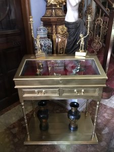 Fine Vintage Elegance French Guiltwood Bijouterie Cabinet Lift Up Display Glass Lid With Two Drawers Solid Wood Car-case WithTurned And Ornate Carved Motifs On Each End Lower Platform Display Area Was Purchased From A Jewellery Shop In Paris Which Was Sadly Closing Dimensions In Inches Height 40.5” Width 34” Depth 19” Display Top 17” x 32” Bottom Shelf Display Area Depth 19.5” Length 35.5”